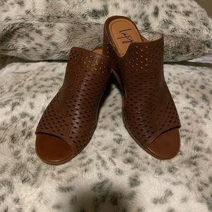 Genuine leather Latigo wedge sandals.